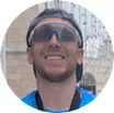 James Prosser, wearing sunglasses and a cap